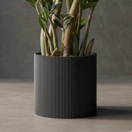 Modern 3D-printed Palo planter with removable base for easy repotting